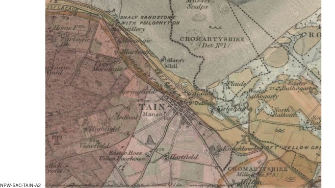 Historic geological map of Tain, showing the town, railway, coastline and coloured rock formations.